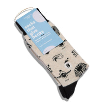 Load image into Gallery viewer, Socks that Give Books - Small (Ivory Hieroglyphics)
